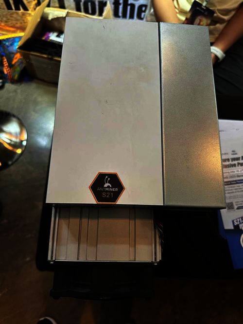 A powerful mining rig stacked with multiple GPUs, showcasing its high hashrate potential